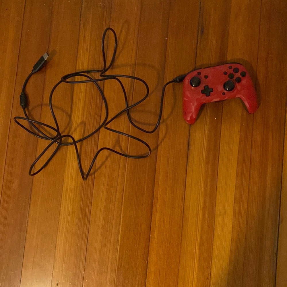 Nintendo wired controller. About 8 or 9 feet long.
